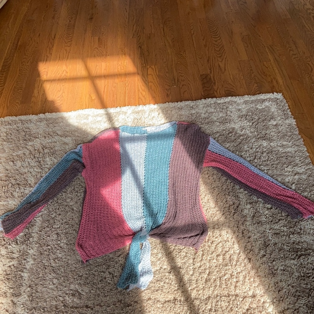 Pink,light blue,teal,brownish-purple knit-sweater